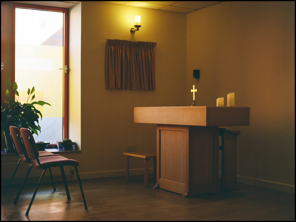 Photograph from Light Pours In, Kieran Marsh's exhibition of analogue photography exploring England's community spaces and everyday life.